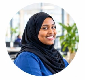 Community participant smiling in a professional setting